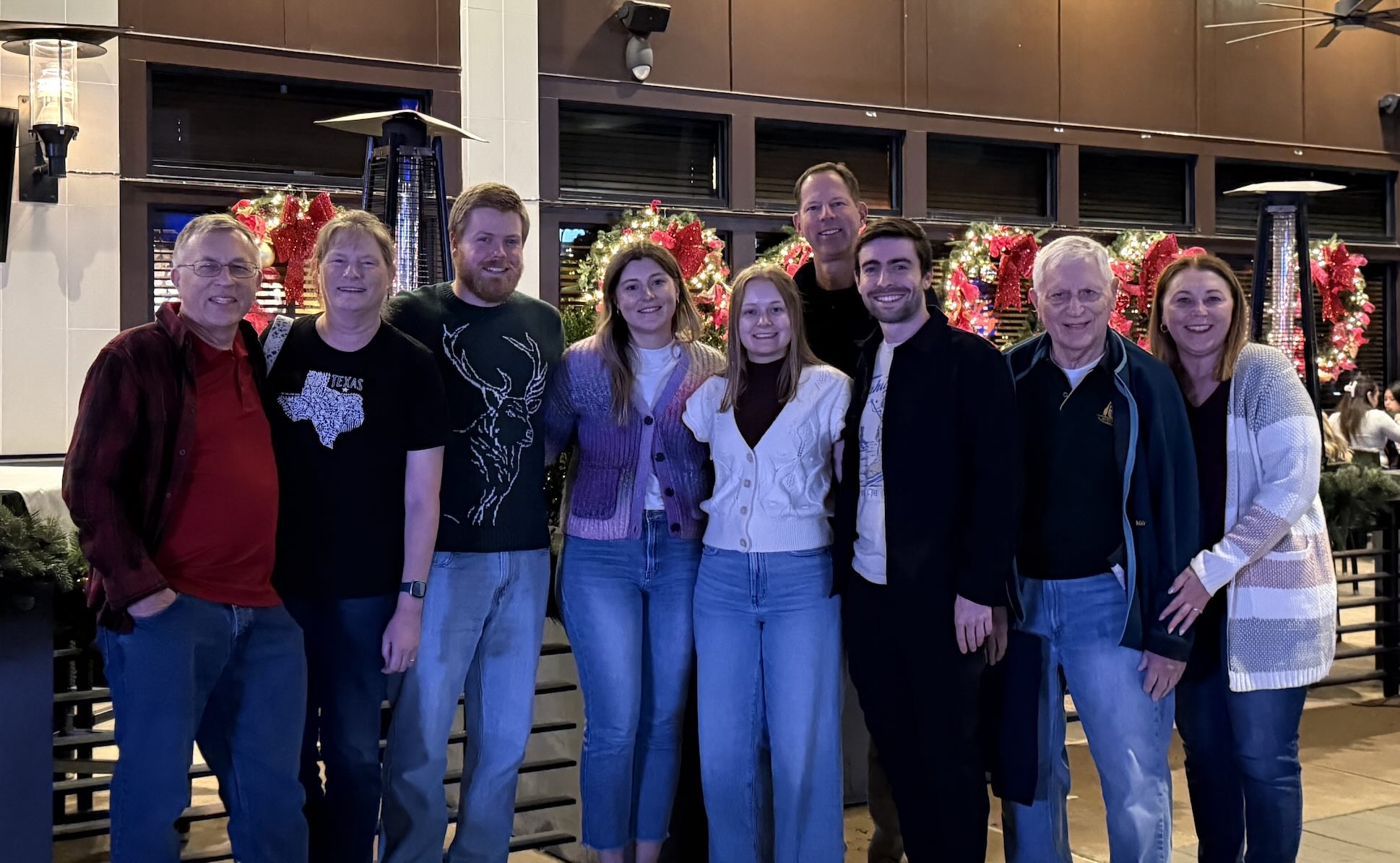 A group of people posing for a photo
AI-generated content may be incorrect.