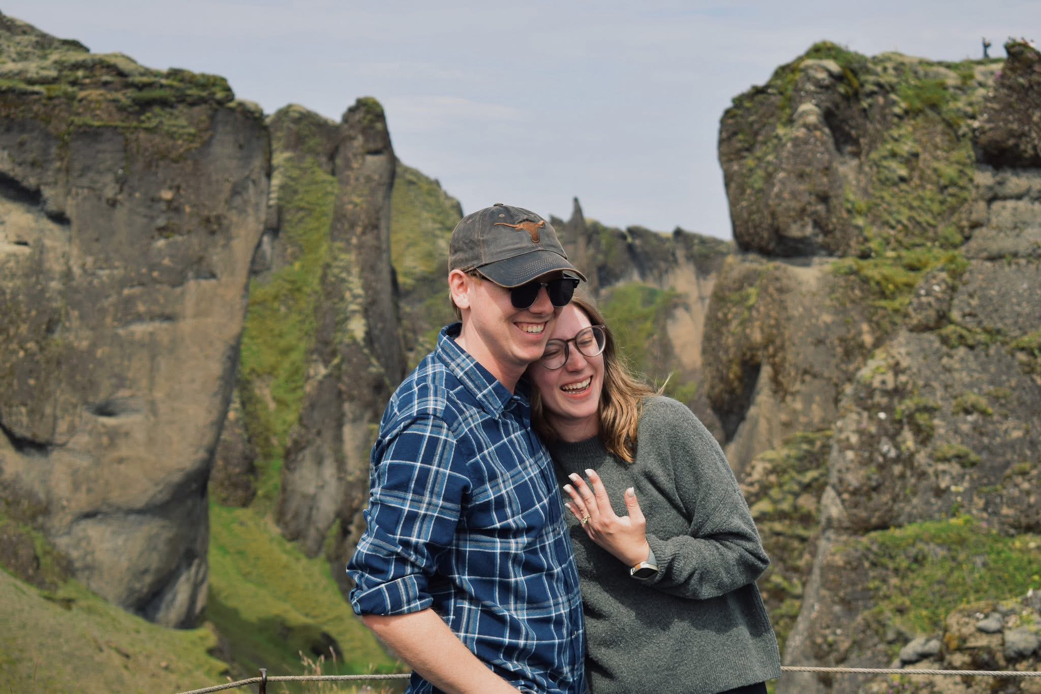 A person and person posing for a picture
AI-generated content may be incorrect.